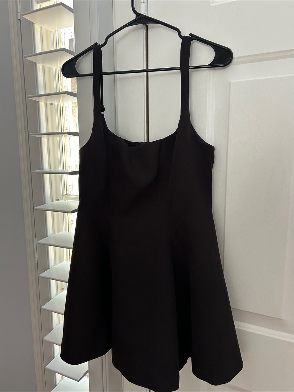 Sleek Black Mini Dress with Wide Straps